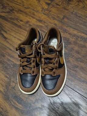 Kids Brown and Black Nike Dunk Low-Top Sneakers
